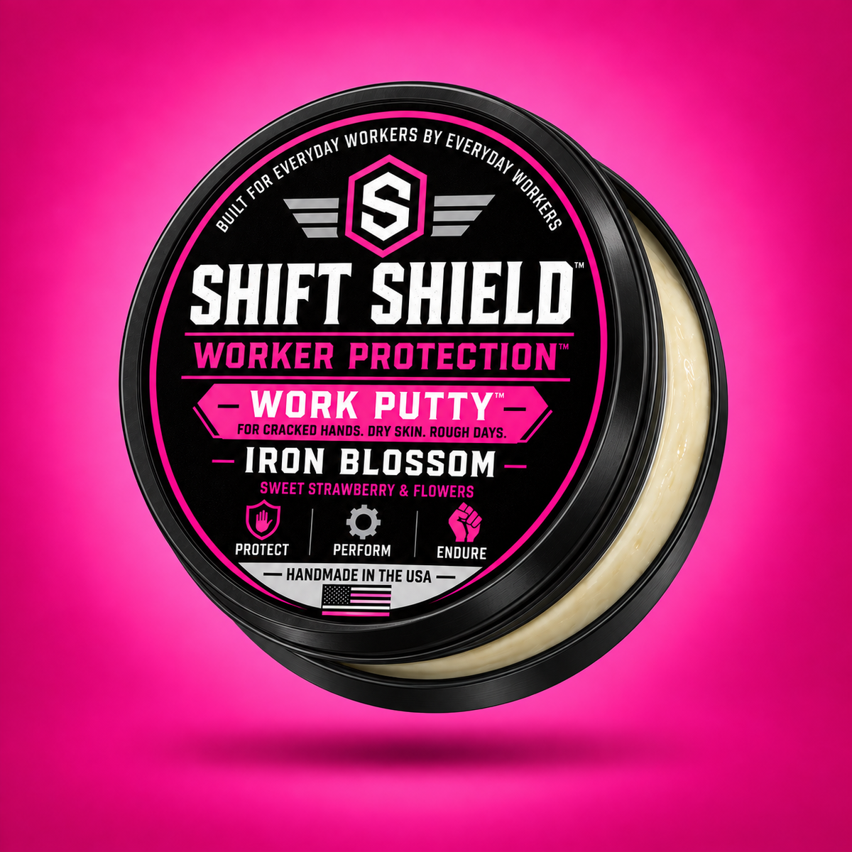 Shift Shield Work Putty iron blossom 2 oz black tin with lid slightly open