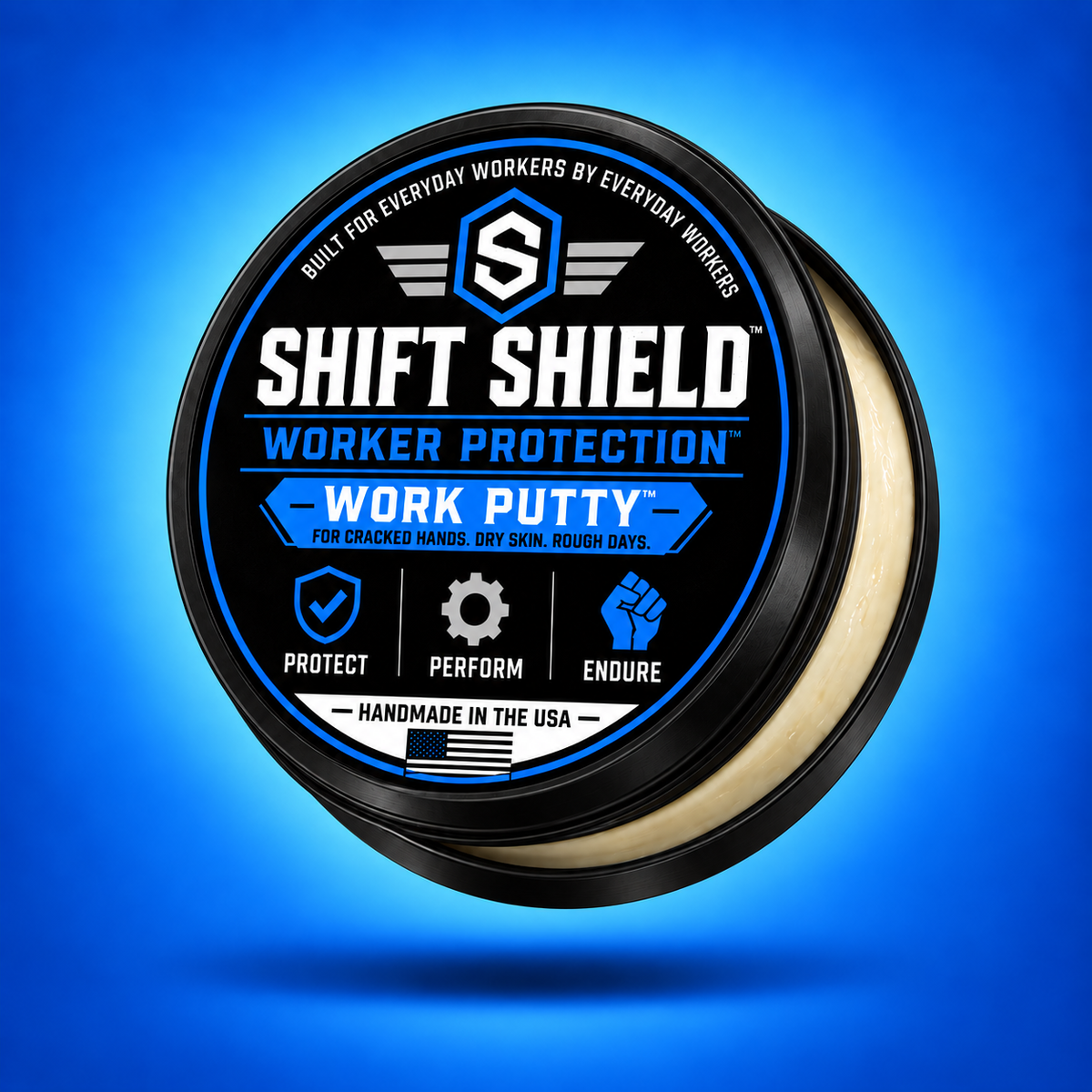 Shift Shield Work Putty original 2 oz black tin with lid slightly open